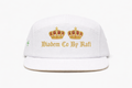 90's baby embroidered Diadem Co By Rafi double crown 5 panel hats in white and royal red with gold crowns and authentic green cross embroidered on the side. In old English letters.