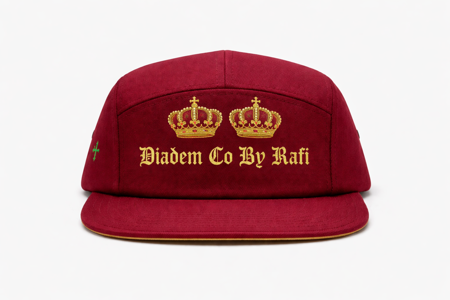 90's baby embroidered Diadem Co By Rafi double crown 5 panel hats in white and royal red with gold crowns and authentic green cross embroidered on the side. In old English letters.